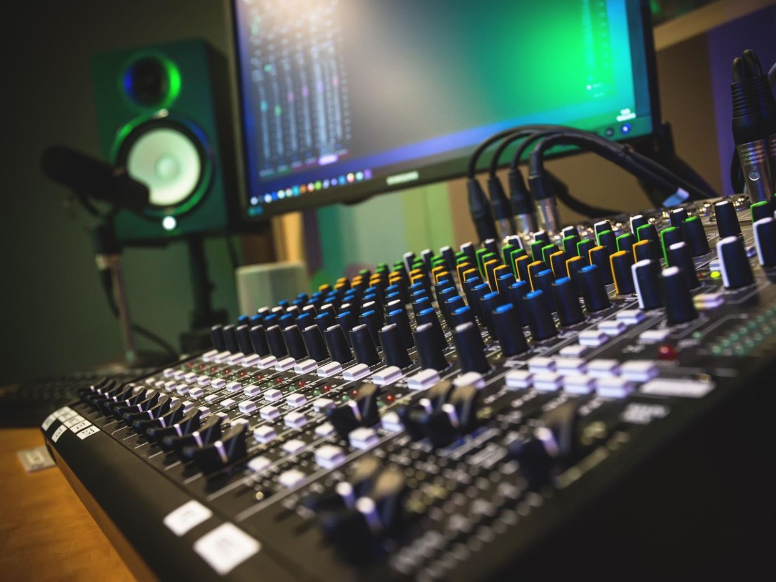 recording studio mixing board microphone computer screen speaker